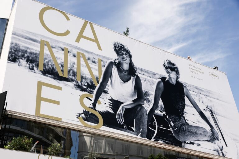 epa12947079 The poster for the 79th edition of the Cannes Film Festival hangs on the facade of the Palais des Festivals one day before the beginning of the 79th Cannes Film Festival in Cannes, France, 11 May 2026. The film festival runs from 12 to 23 May 2026. EPA/TERESA SUAREZ